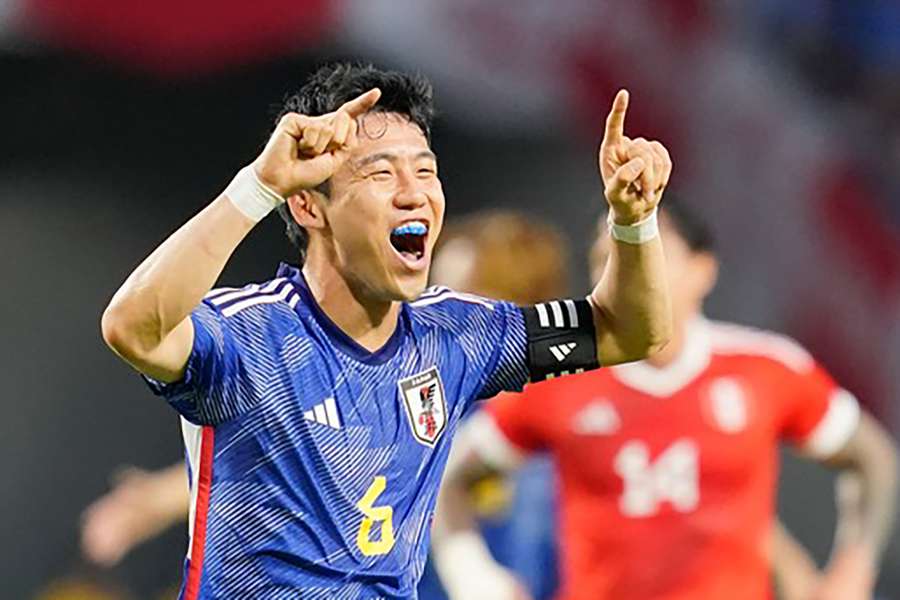 Endo celebrates a Japan goal