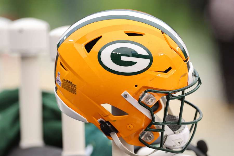 Green Bay Packers helmet hangs on the sidelines (2023)
