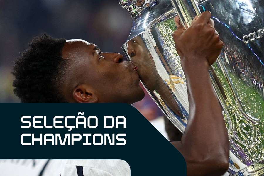 Vinicius Junior beija o troféu conquistado em Wembley