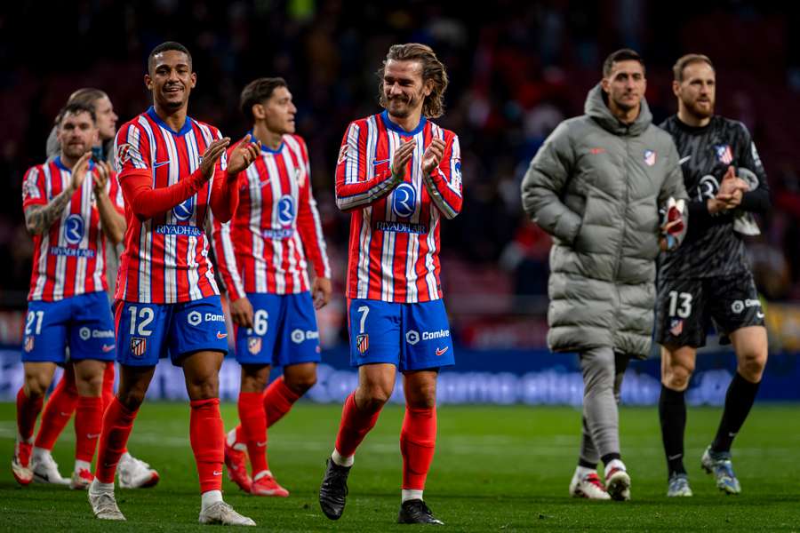 Atletico Madrid clap their fans after the game