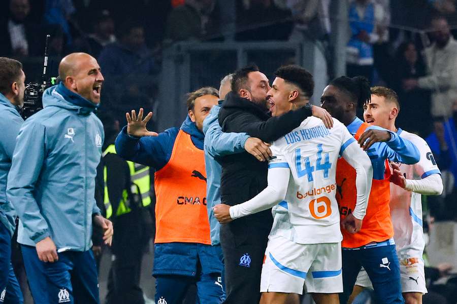 Luis Henrique celebrates his goal with his Marseille manager