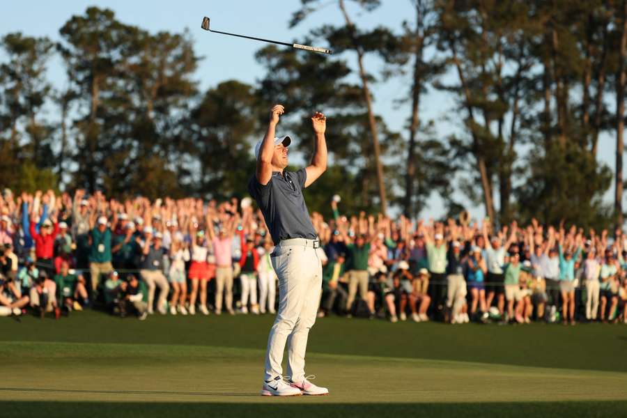 Rory McIlroy celebrates winning the 2025 Masters after the first play-off hole at Augusta National Golf Club