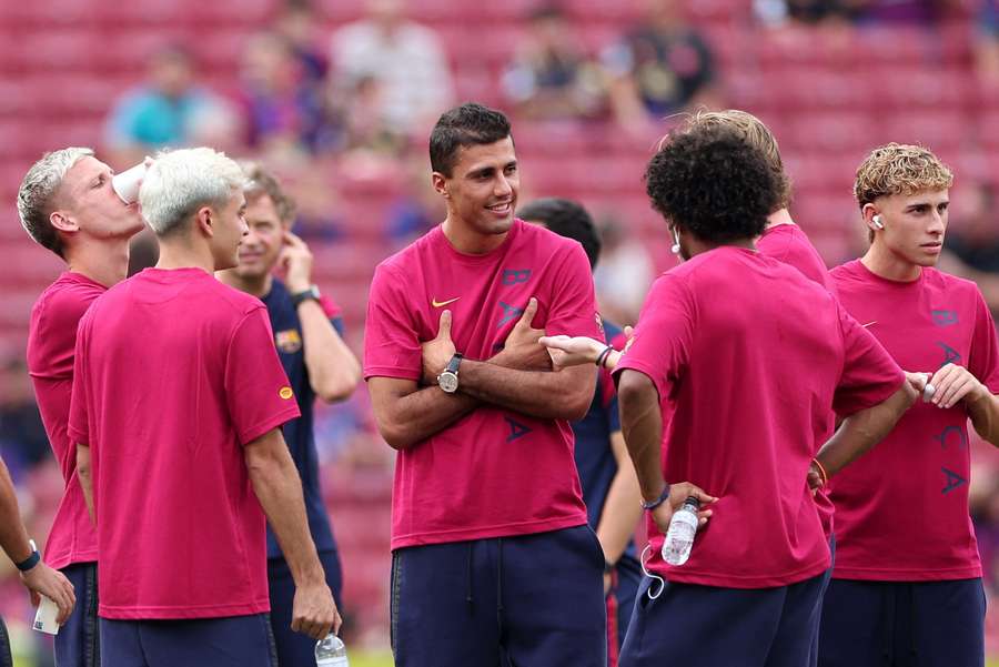 FC Barcelona's Rodri with teammates