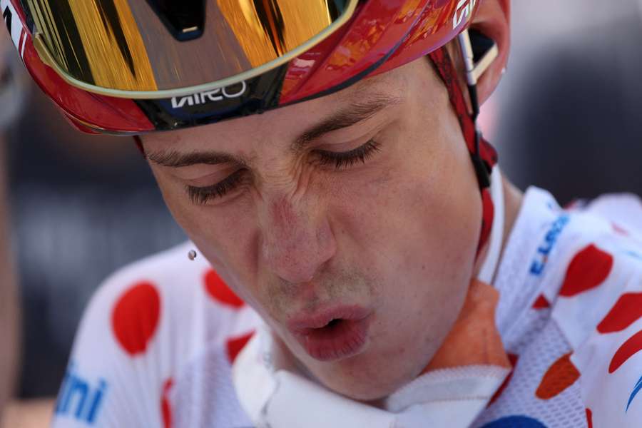 Vingegaard wearing the polka-dot jersey reacts before the start of stage 9 Vingegaard wearing the polka-dot jersey reacts before the start of stage 9