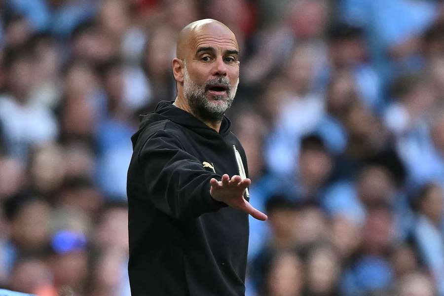 Pep Guardiola on the touchline
