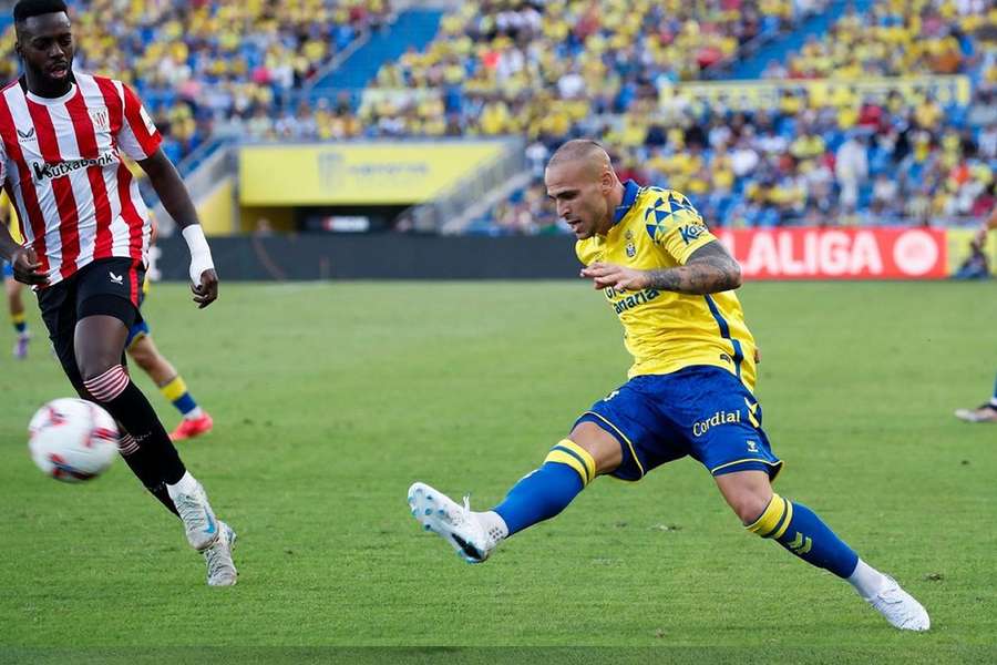 Manu Fuster of Las Palmas celebrates with teammates after scoring the team's third goal