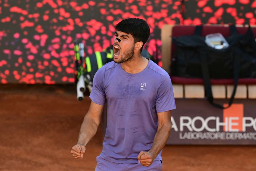 Carlos Alcaraz celebrates his victory after his men's singles semi-final match against Lorenzo Musetti in Rome