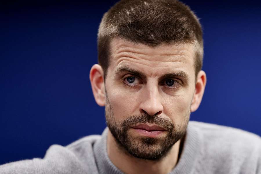Gerrard Pique looks on