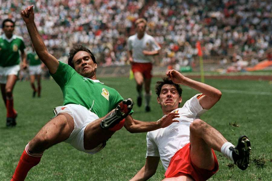 Hugo Flores (left) from Mexico vies with Hugo Broos at the 1986 World Cup. Hugo Flores (left) from Mexico vies with Hugo Broos at the 1986 World Cup.
