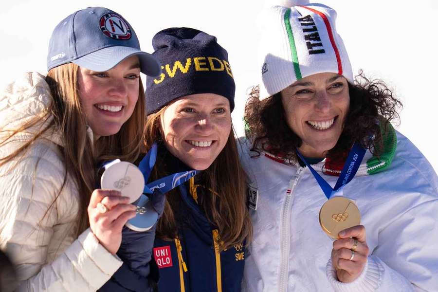 Sweden's Hector (centre) with her silver medal alongside Stjernesund (left) and Brignone