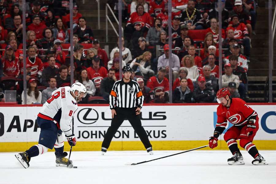 Alex Ovechkin of the Washington Capitals shoots and scores a goal during the second period of the game against the Carolina Hurricanes