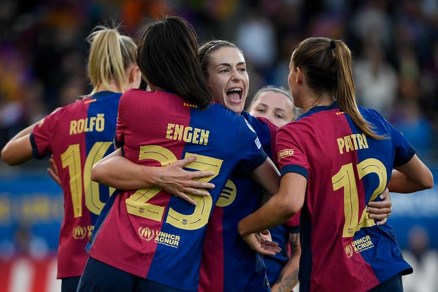 Barcelona celebrate a goal as they defeat Chelsea in the first leg of their UEFA Women's Champions League semi-final.