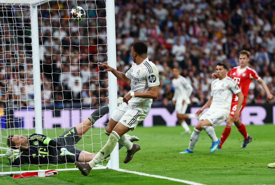 Real Madrid's Kylian Mbappe scores their first goal