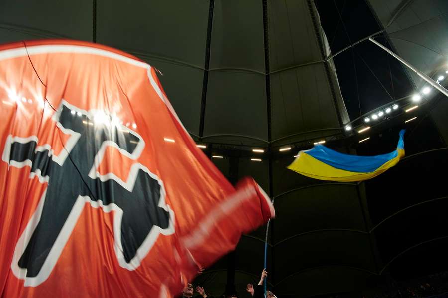 A Shakhtar Donetsk flag and a Ukraine flag A Shakhtar Donetsk flag and a Ukraine flag