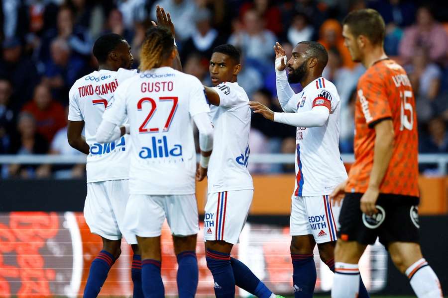 Lyon players celebrating a goal