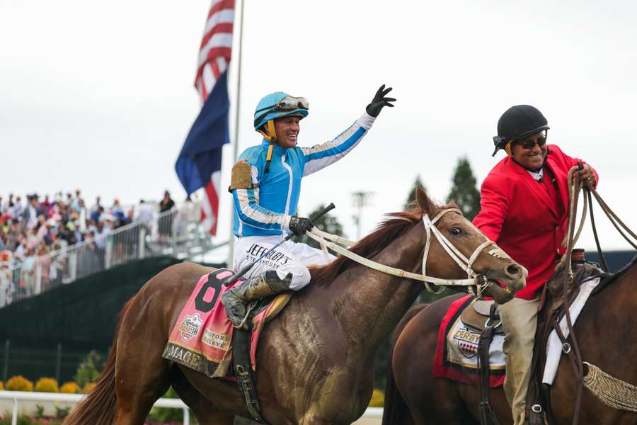 Jockey Javier Castellano celebrates atop Mage after winning the 149th running of the Kentucky Derby at Churchill Downs