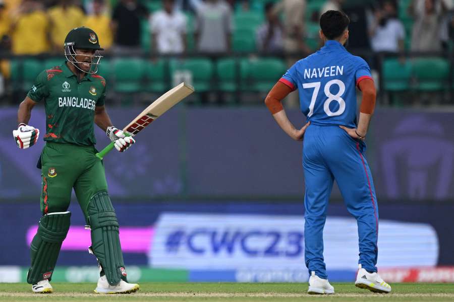 Bangladesh's Najmul Hossain Shanto (L) celebrates