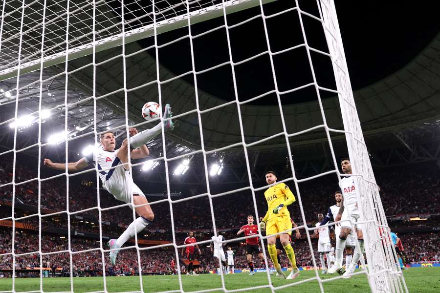 Spurs defender Micky van de Ven saves the ball off the line in the UEFA Europa League final against Manchester United