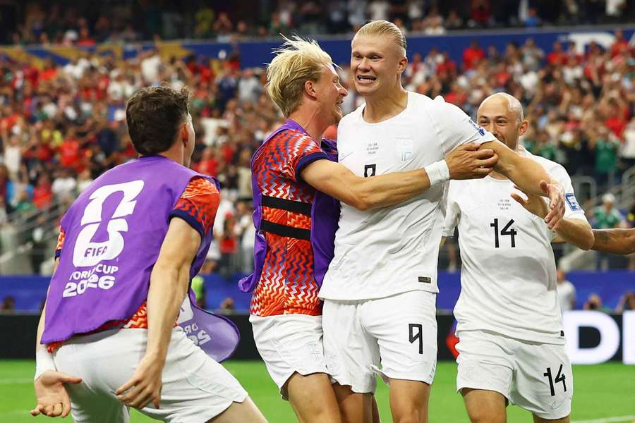Norway's Erling Haaland celebrates scoring the winner with teammates