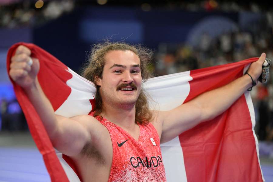 Ethan Katzberg heeft de gouden medaille gewonnen in het kogelslingeren