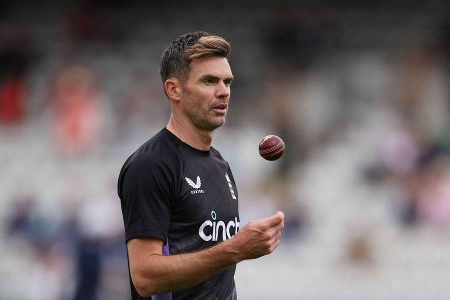 James Anderson warms up ahead of day one of the first Test between England and West Indies