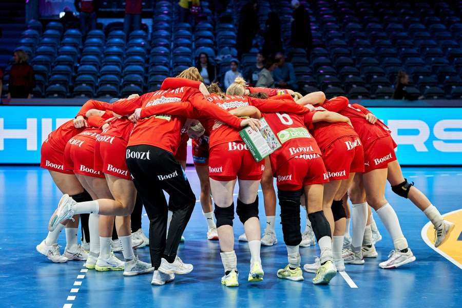 The Danish squad assembled in front of a practically empty arena in Rotterdam The Danish squad assembled in front of a practically empty arena in Rotterdam