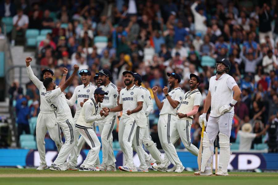 India celebrate their incredible win over England