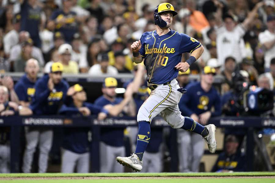 Brewers' Sal Frelick runs home to score during NLDS Game 4 against the Padres
