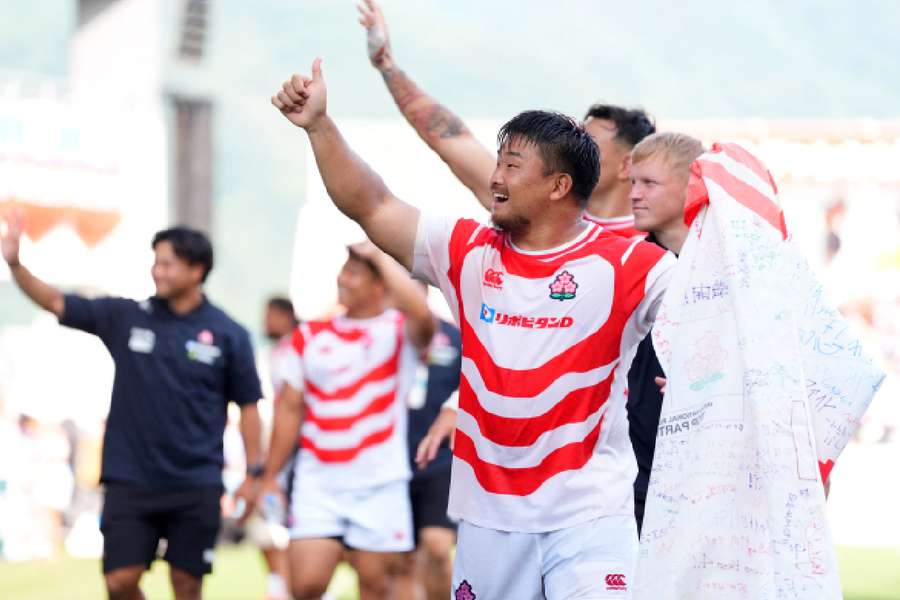 Japan celebrate a hard-fought win 
