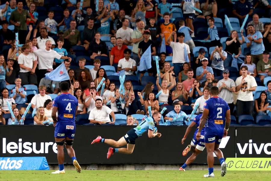 Max Jorgensen dives to score a try against Fijian Drua on Saturday. Max Jorgensen dives to score a try against Fijian Drua on Saturday.