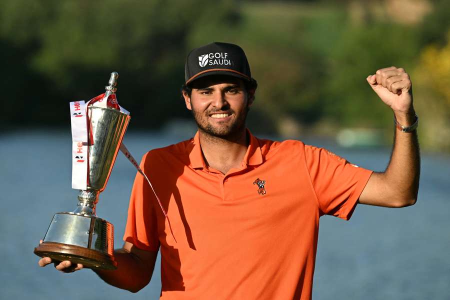 Eugenio Lopez Chacarra of Spain holding the trophy Eugenio Lopez Chacarra of Spain holding the trophy