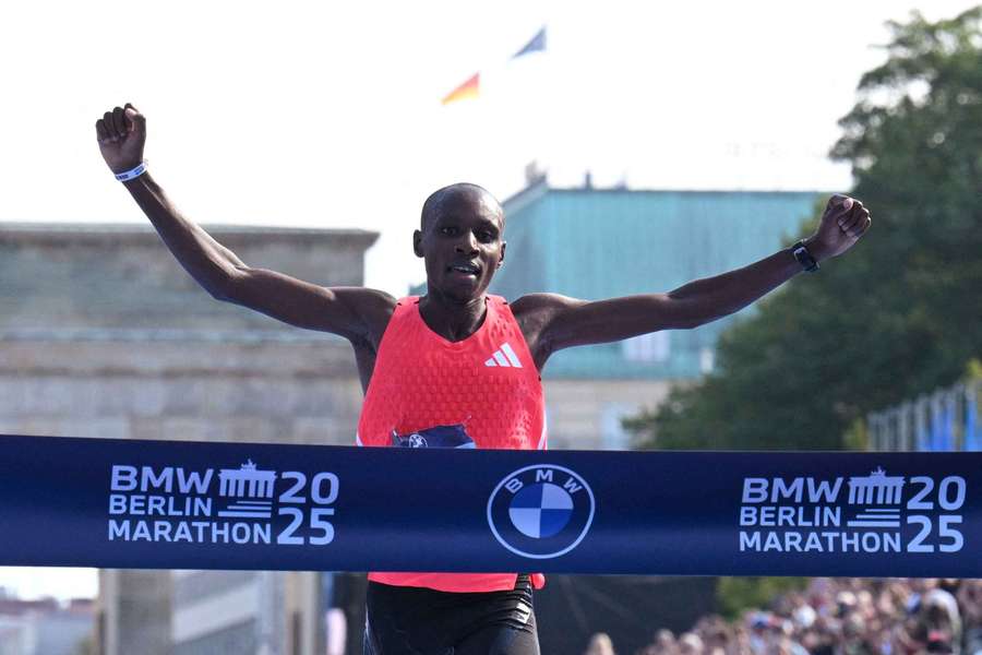 Kenya's Sabastian Sawe crosses the line to win the Berlin Marathon