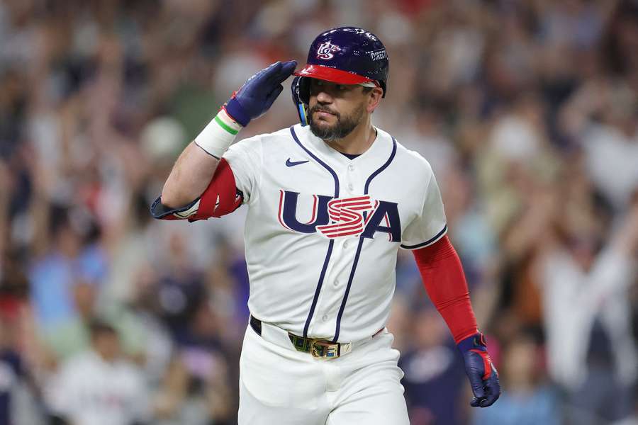 USA's Kyle Schwarber reacts after hitting home run against Great Britain in 2026 World Baseball Classic