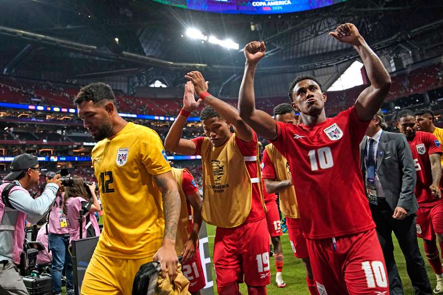 De spelers van Panama vieren de overwinning
