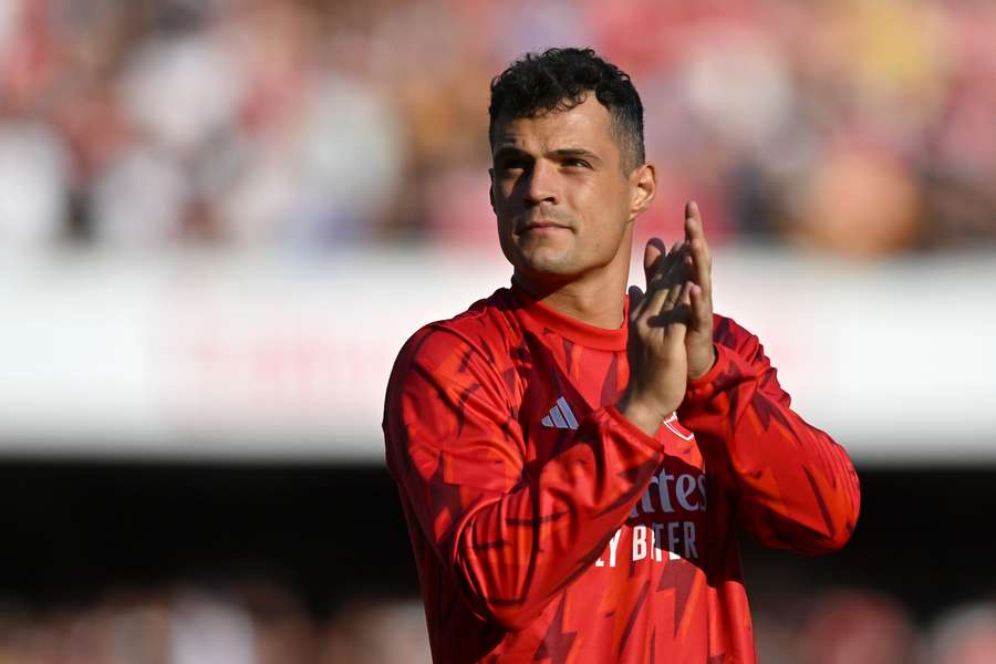 Arsenal's Swiss midfielder Granit Xhaka acknowledges supporters at the end of the English Premier League football match between Arsenal and Wolverhampton Wanderers