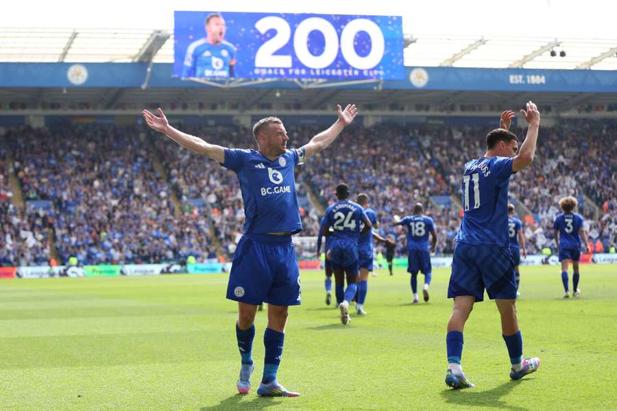 Jamie Vardy celebrates his landmark goal for Leicester City
