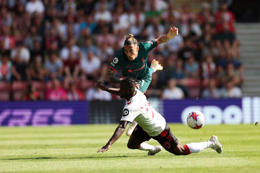 Liverpool's Greek defender Kostas Tsimikas (L) fights for the ball with Southampton's French midfielder Ibrahima Diallo