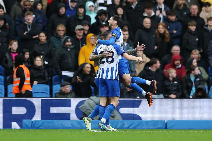 Evan Ferguson of Brighton & Hove Albion celebrates with teammates after scoring the team's first goal