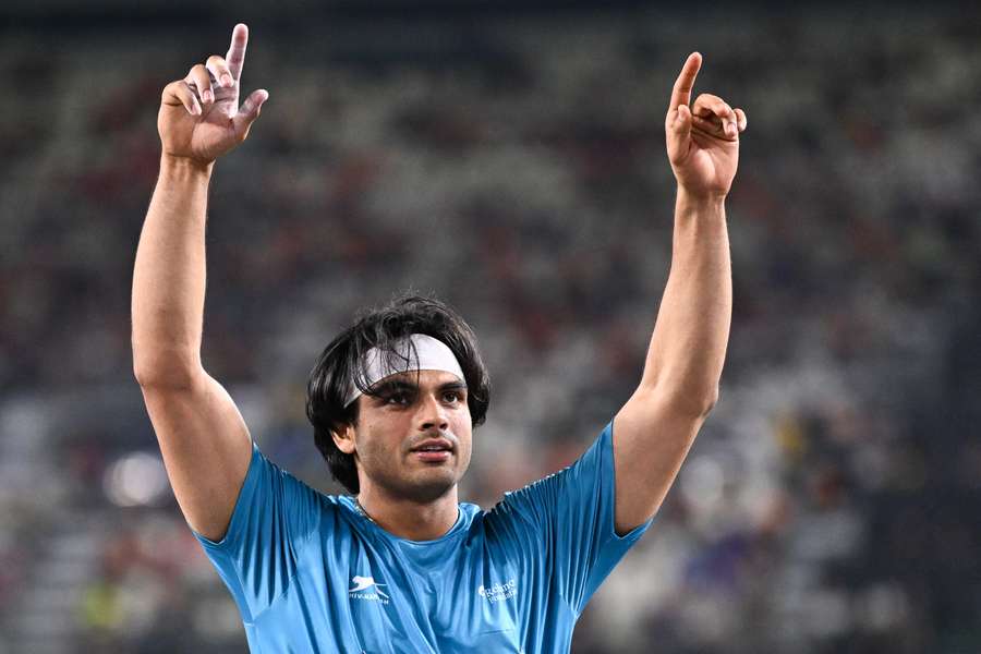 Neeraj Chopra celebrates after being crowned world champion