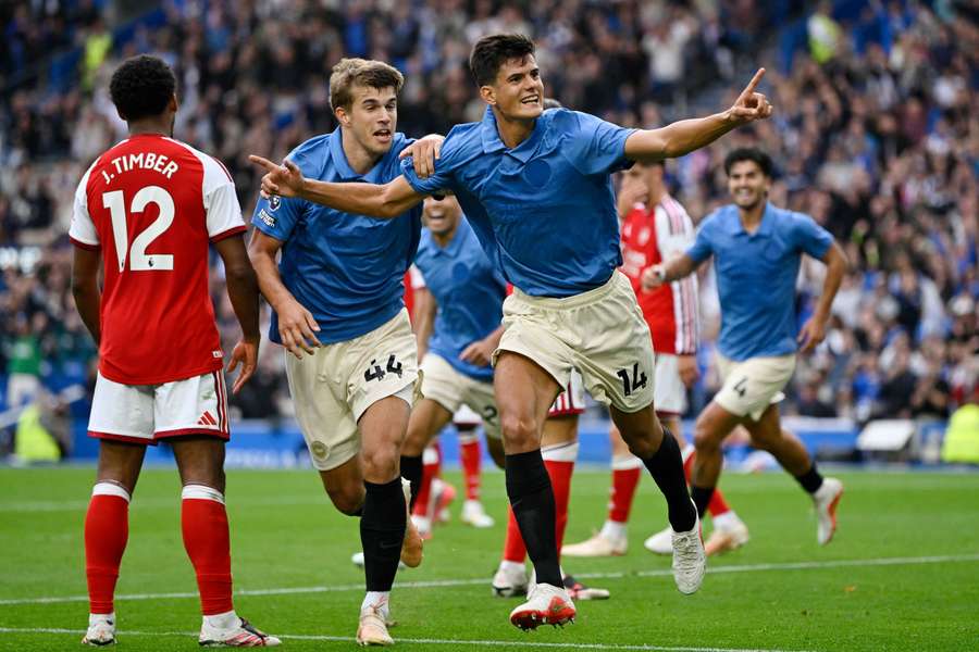 Brighton and Hove Albion's Chema Andres celebrates scoring their third goal with Luka Vuskovic Brighton and Hove Albion's Chema Andres celebrates scoring their third goal with Luka Vuskovic
