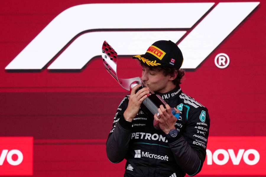 Mercedes' Andrea Kimi Antonelli celebrates on the podium with a trophy after winning the Canadian Grand Prix Mercedes' Andrea Kimi Antonelli celebrates on the podium with a trophy after winning the Canadian Grand Prix