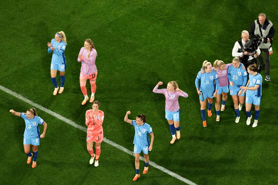 England's players celebrate after their semi-final win