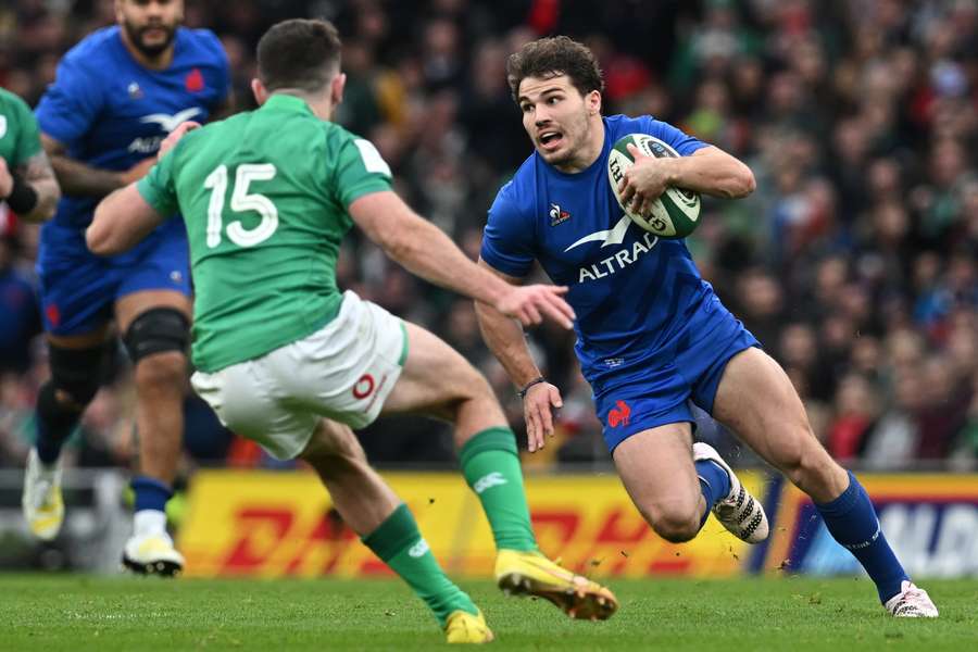France's scrum-half Antoine Dupont makes a break during the Six Nations international rugby union match between Ireland and France France's scrum-half Antoine Dupont makes a break during the Six Nations international rugby union match between Ireland and France
