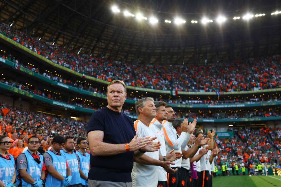 Netherlands coach Ronald Koeman and his coaching staff before the match