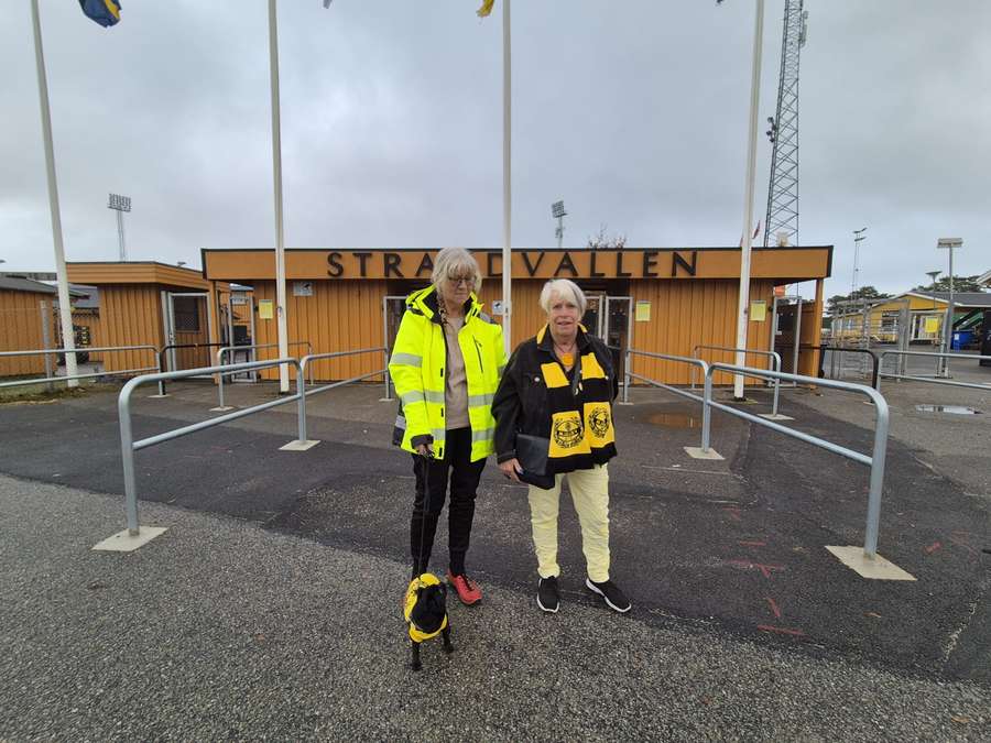 Gull-Brit Norberg with a friend and her dog, all dressed for the occasion Gull-Brit Norberg with a friend and her dog, all dressed for the occasion