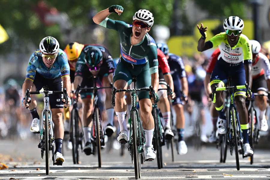Jasper Philipsen cycles to the finish line ahead of Mark Cavendish and Biniam Girmay to win the seventh stage of the Tour de France