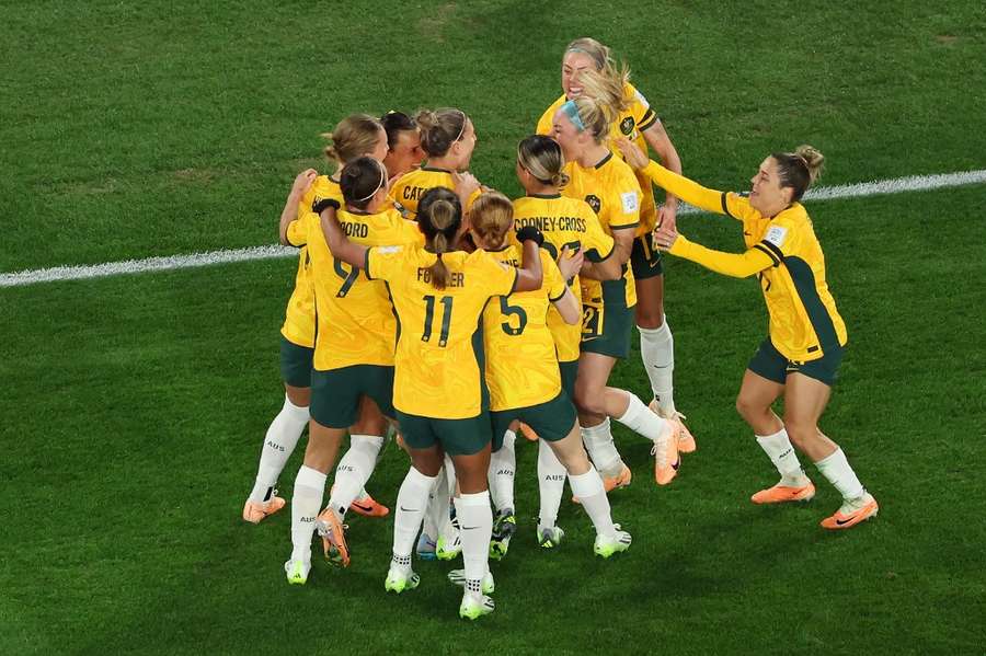 Australia's players celebrate the only goal of the game
