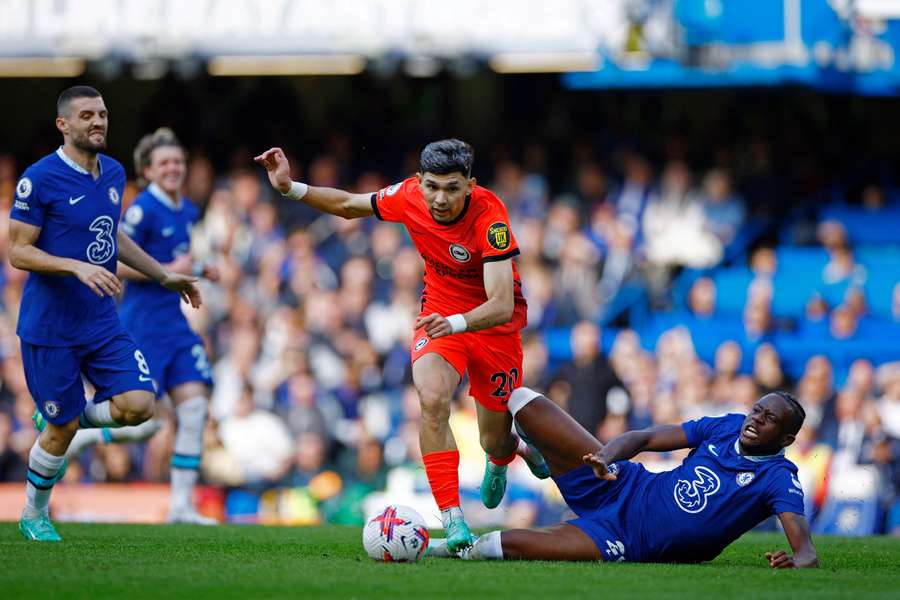 Julio Enciso skips over a Chelsea challenge in the win for Brighton