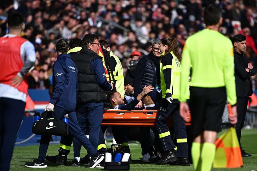 Neymar was stretchered off during the match