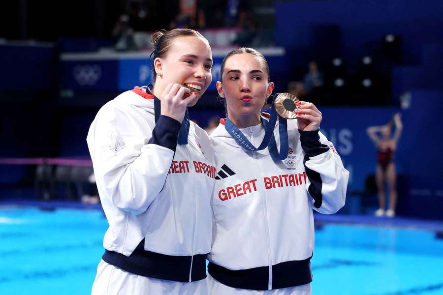 Yasmin Harper and Scarlett Mew Jensen celebrate with their medals